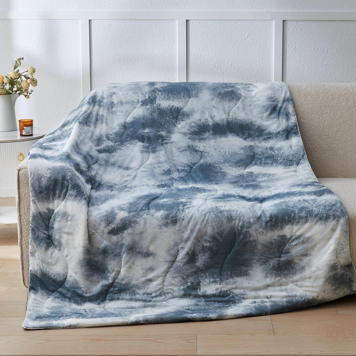 Cushious cooling comforter being machine washed for easy care.