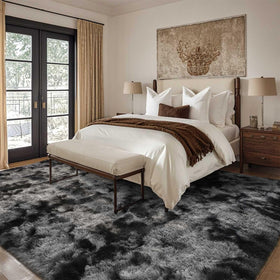 Cuzwlovita dark-grey tie-dye rug bedroom ambience with plush softness.
