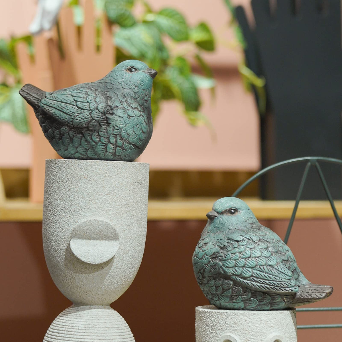 Cynkeyee ornamental bird figurines brighten shelves and mantels.