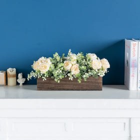 Dahey assembled centerpiece on dining table showcases the look.