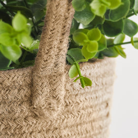 Dahey brown wall decor display highlighting rustic storage baskets.