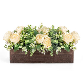 Dahey wooden box centerpiece with flowers enhances rustic dining decor.