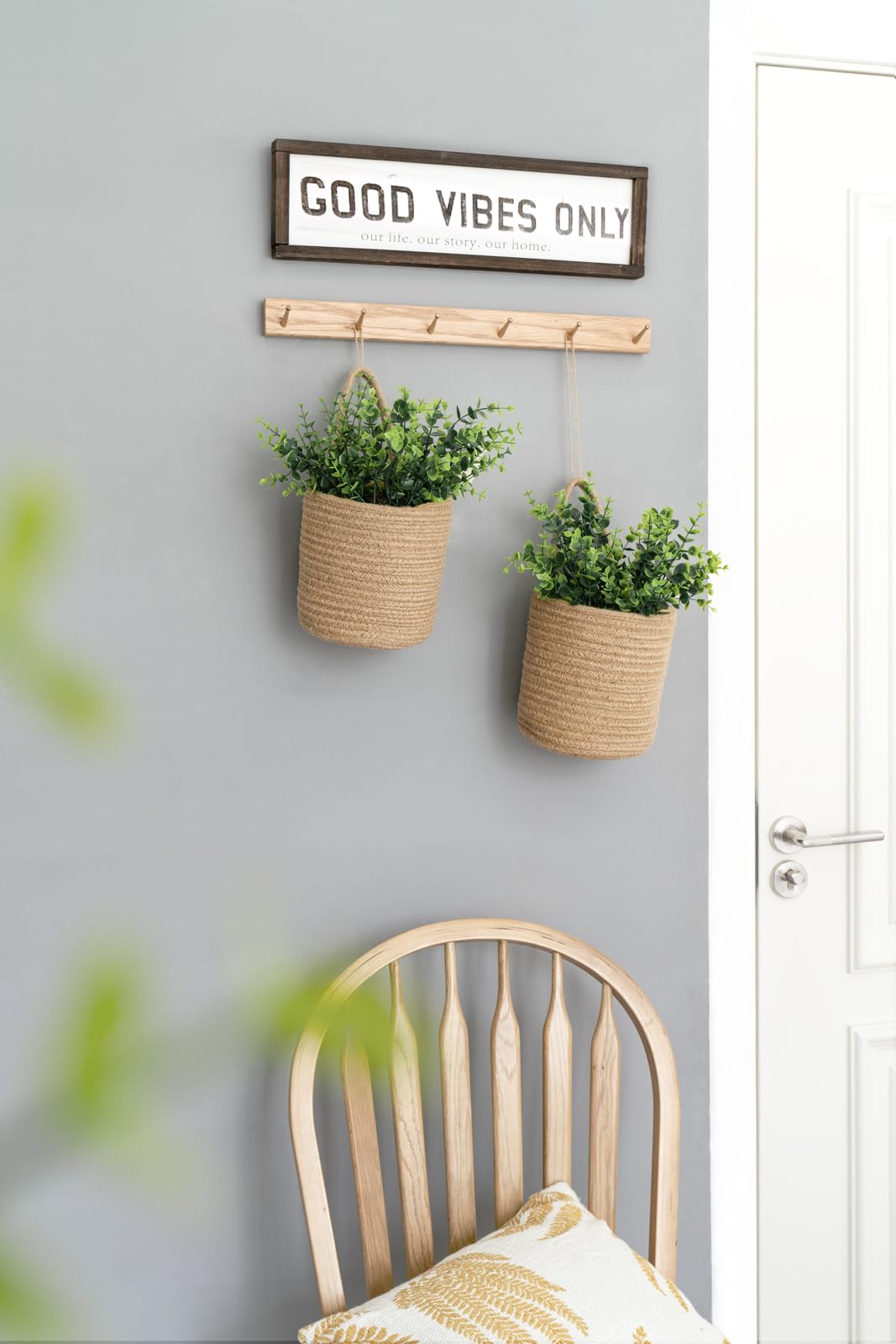 Dahey farmhouse boho wall decor in rustic brown tones.