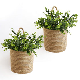 Dahey two-pack wall hanging rope basket with eucalyptus, a stylish space-saving storage and decor solution.