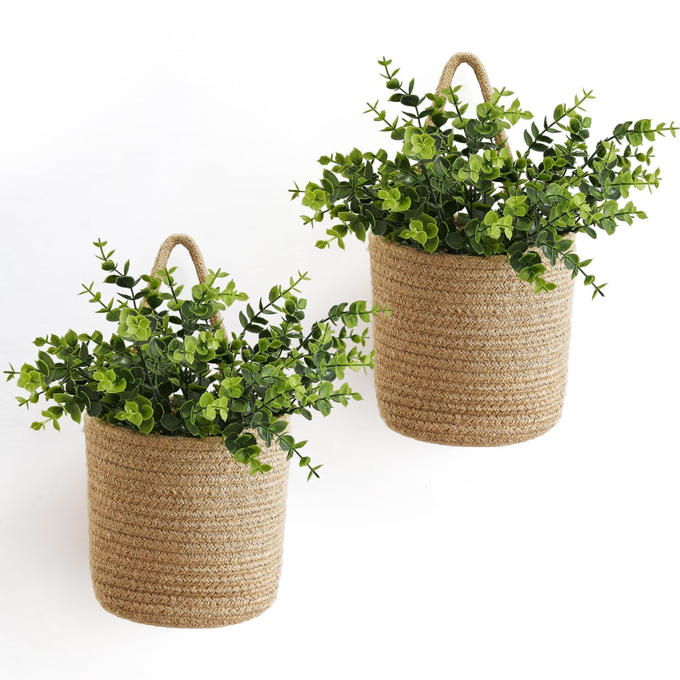 Dahey two-pack wall hanging rope basket with eucalyptus, a stylish space-saving storage and decor solution.