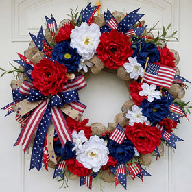 Daifunli patriotic wreath on front door with 16 inch size and bold red, white, blue accents.