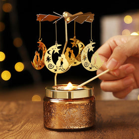 DAISRED cat candle rotating blades closeup highlights elegant metal blades.