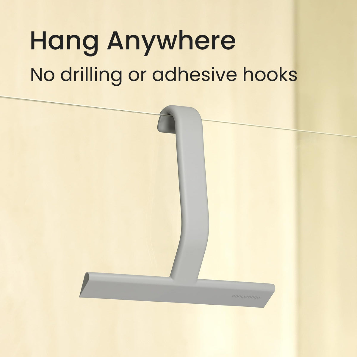 dancemoon JustHang silicone blade gliding smoothly on a flat surface for streak-free cleaning