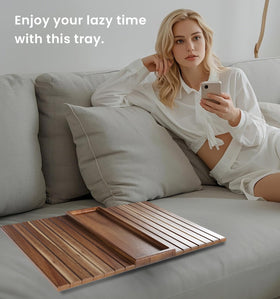 Danfoxer arm tray holds drinks and snacks during movie night