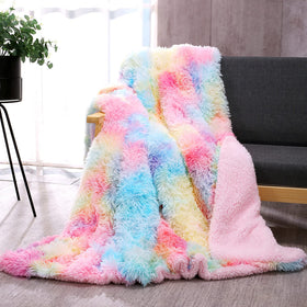 Dangtop fuzzy faux fur throw blanket in rainbow tie-dye adds cozy color and warmth.
