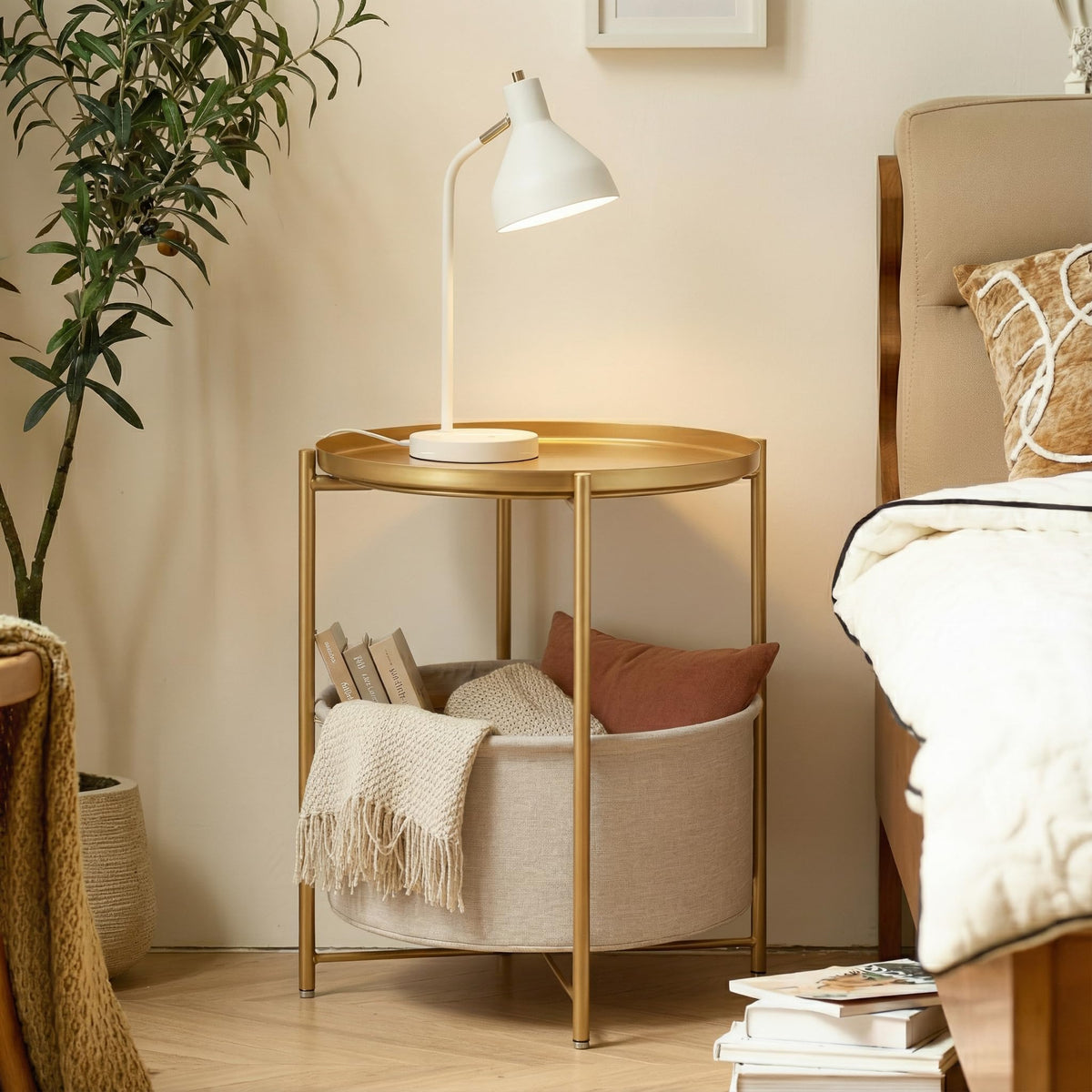 Danpinera gold side table with fabric storage basket for organized space.