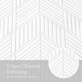 Davulos King Quilt features durable edge stitching for lasting wear.