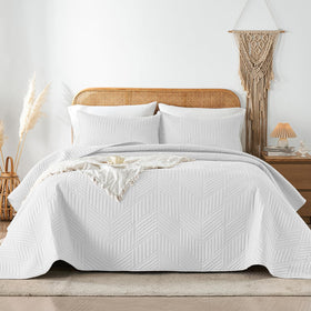 Davulos King Quilt with embossed pattern adds boho texture and depth.