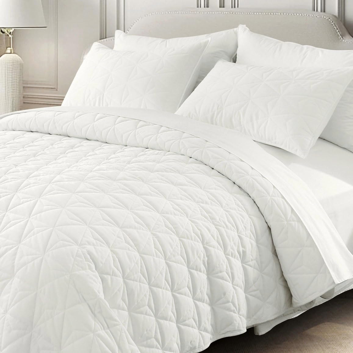 DAWNDIOR oversized king corduroy quilt set on bed with ample coverage.