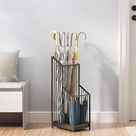 Removable drip tray on dboodb umbrella stand catches rainwater