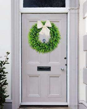 DDHS year-round wreath withstands outdoor use with easy care.