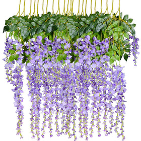 DearHouse wisteria vine garland draped for wedding backdrop and photo zone
