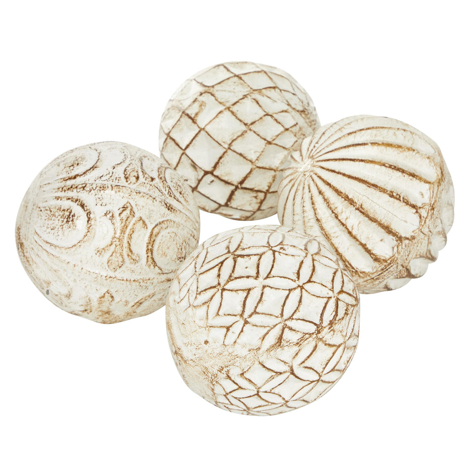 Deco 79 ceramic handmade carved ball orbs add texture to vases and bowls