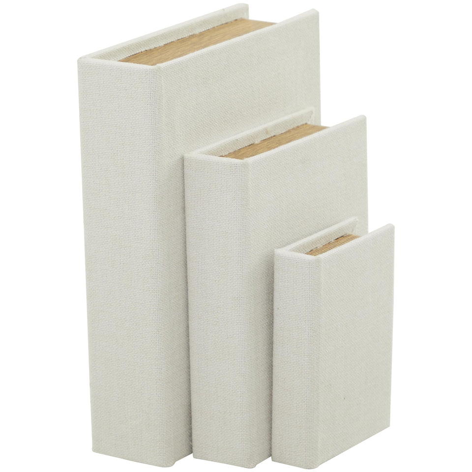 Deco 79 linen fabric book-shaped box set in white, ideal for stylish storage
