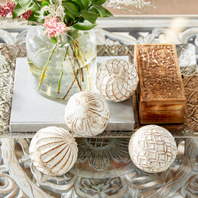 Deco 79 round orbs vase filler in layered arrangements