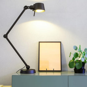 Decolore flat-base easel supports photos and canvases securely.