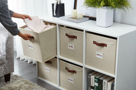 DECOMOMO storage cubes beige neatly stacked on shelves for space efficiency