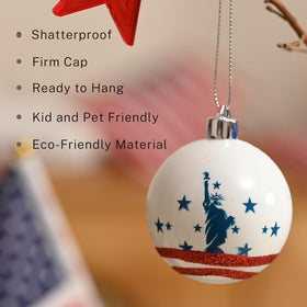 Decor by Hannah patriotic ball with glossy finish reflects light for a bright Independence Day glow.