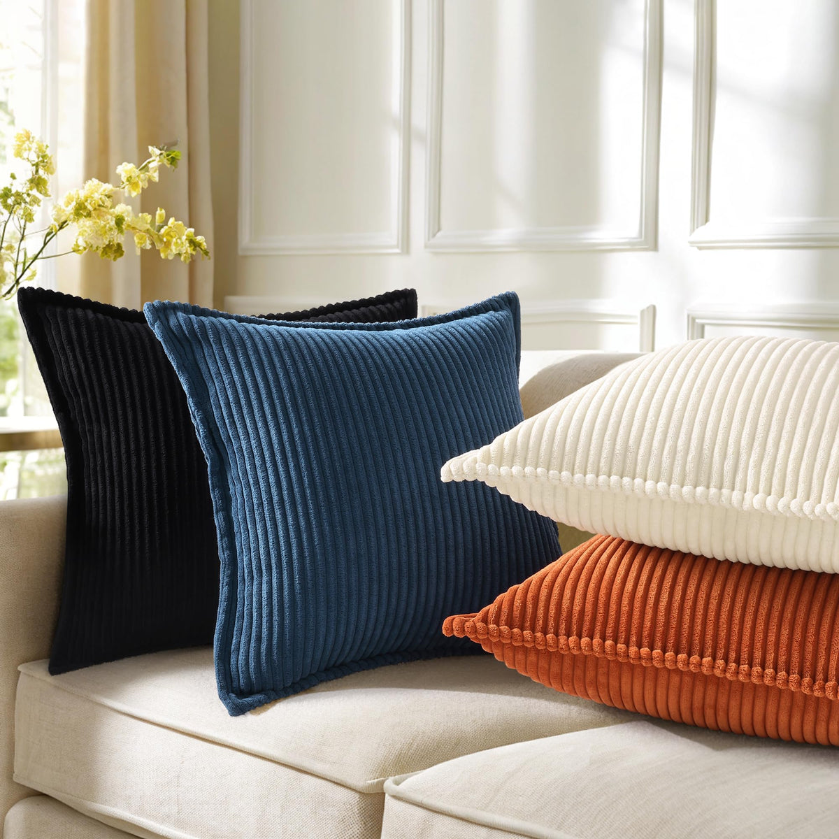 decorUhome navy corduroy 20x20 cover on bed adds soft texture