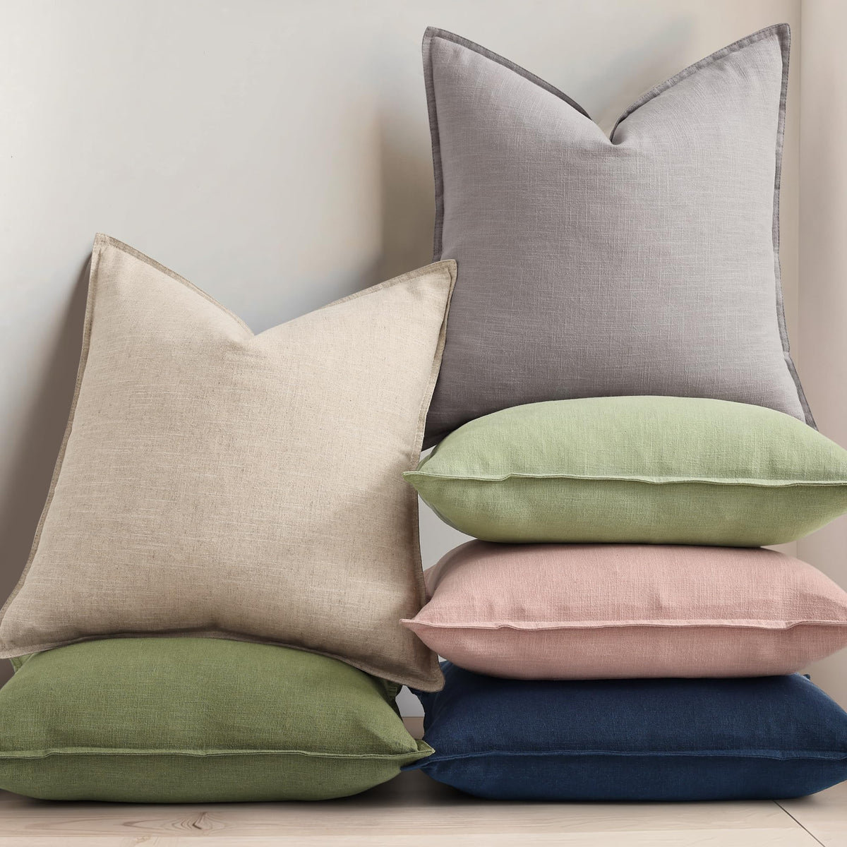 decoruhome navy linen pillow cover shown on a couch for easy styling
