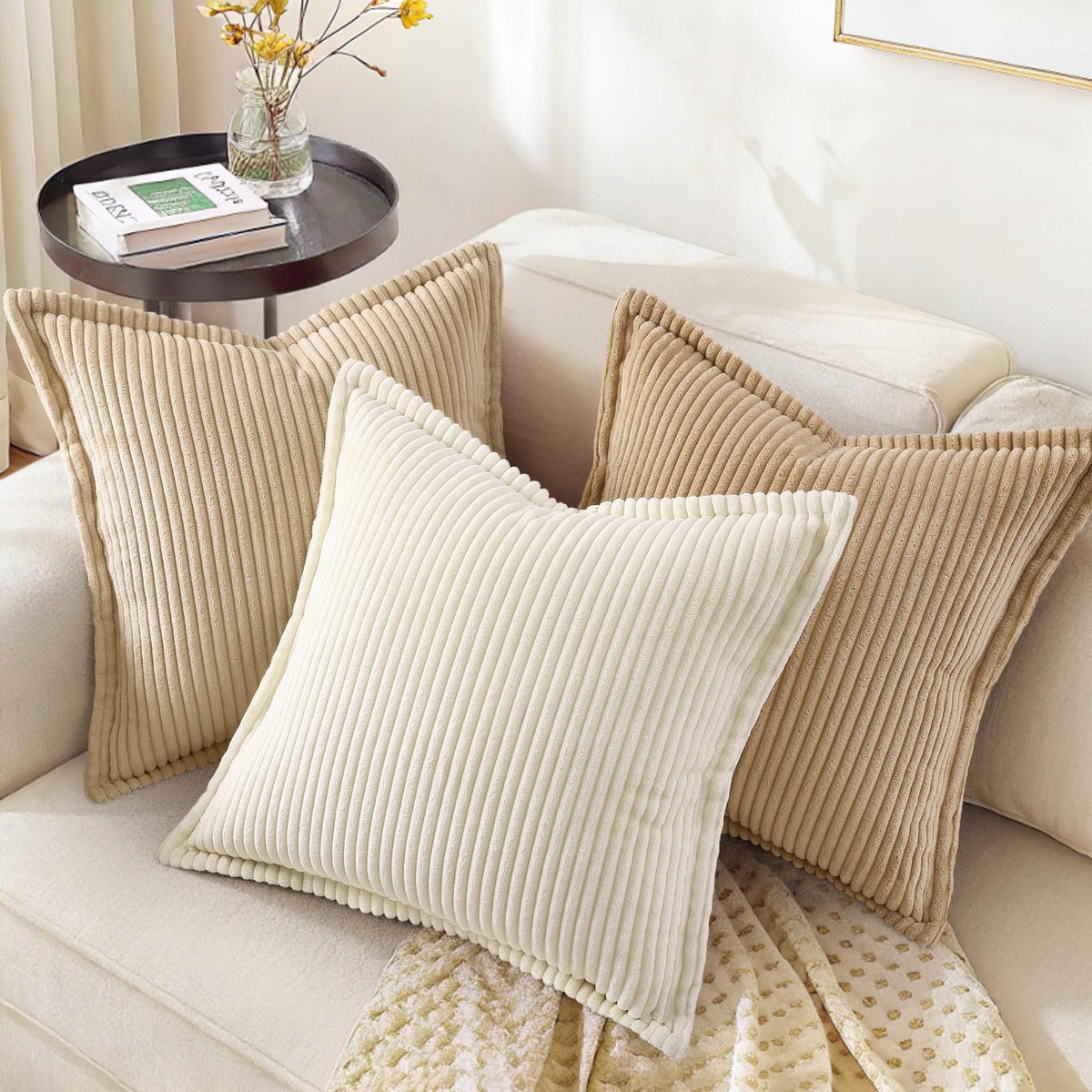 decorUhome Plush corduroy texture close-up emphasizes luxurious, cozy cushions.