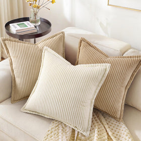 decorUhome Plush corduroy texture close-up emphasizes luxurious, cozy cushions.