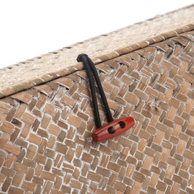 DECRAFTS Rectangular seagrass basket offers organized storage with a warm natural texture.