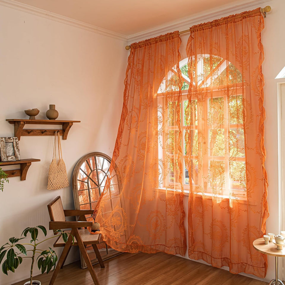 Deeprove orange lace sheer curtains with embroidered florals brighten living spaces.