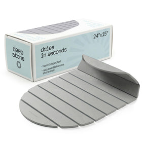 Deepstone foldable stone bath mat in gray, ideal for compact storage and quick-dry floors.