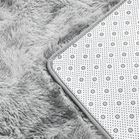Deerhoo rug with latex-dot backing helps keep it in place.