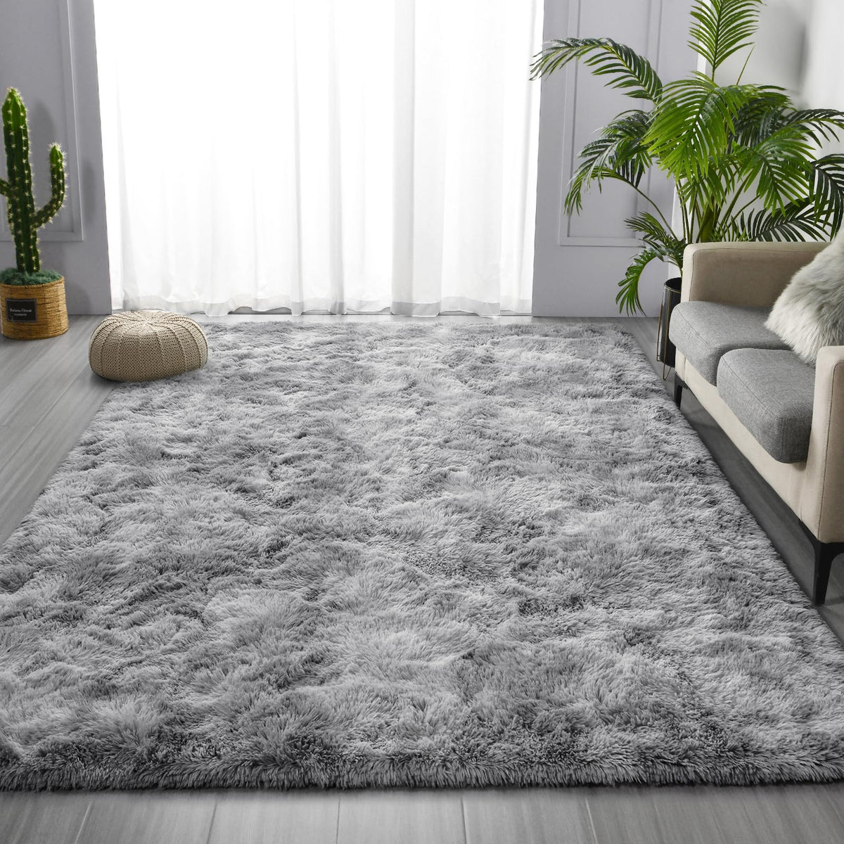 Deerhoo tie-dyed plush rug in living room; vibrant texture for modern decor.