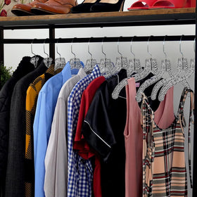 DEILSY clear plastic hangers with swivel hook for easy garment access.