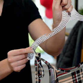DEILSY plastic hangers with non-slip shoulders prevent slipping without fabric damage.