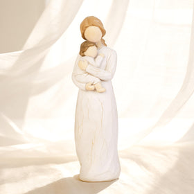Dekismeos standing new mom gift figurine for elegant display on shelves.