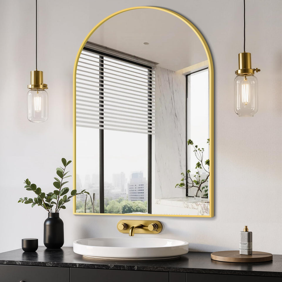 Delma arched mirror 24x36 front view with gold brushed frame for space and light