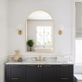 Delma arched mirror gold finish elevating decor while remaining durable