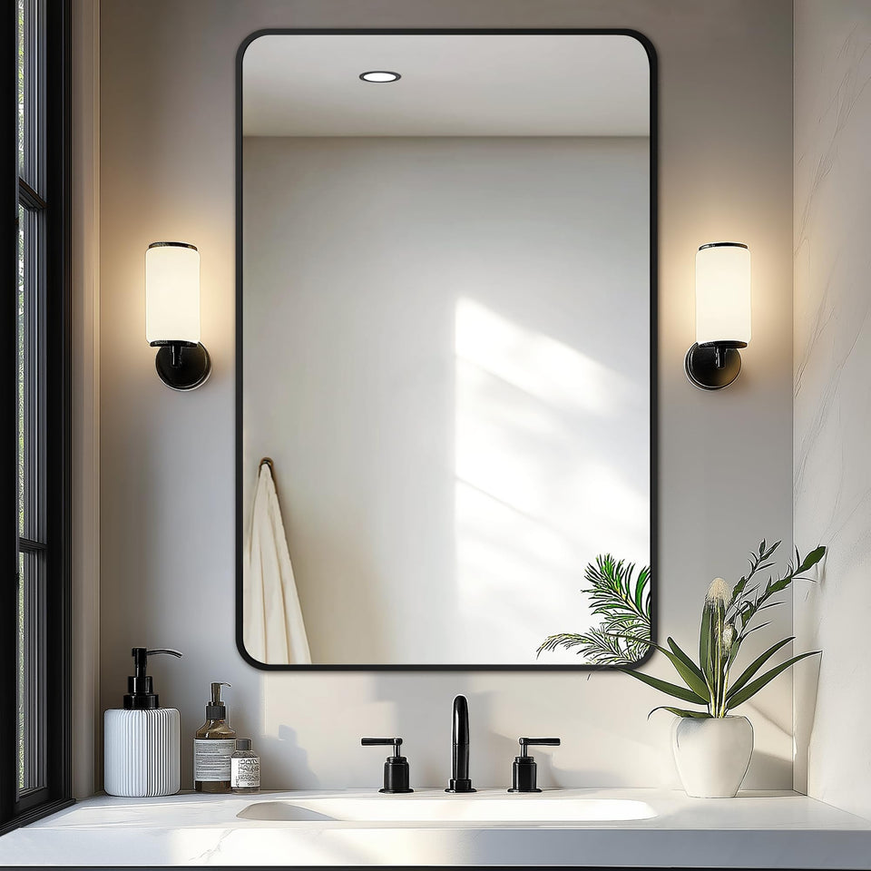 Delma bathroom mirror 36x24 over sink in black frame, ideal for makeup application.