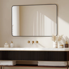 Delma modern black-framed mirror with sleek design enhances any bathroom.