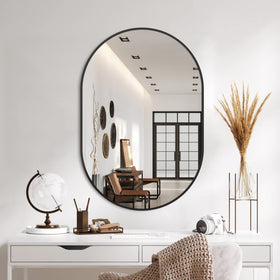 Delma ready-to-hang oval mirror for quick, stylish updates.