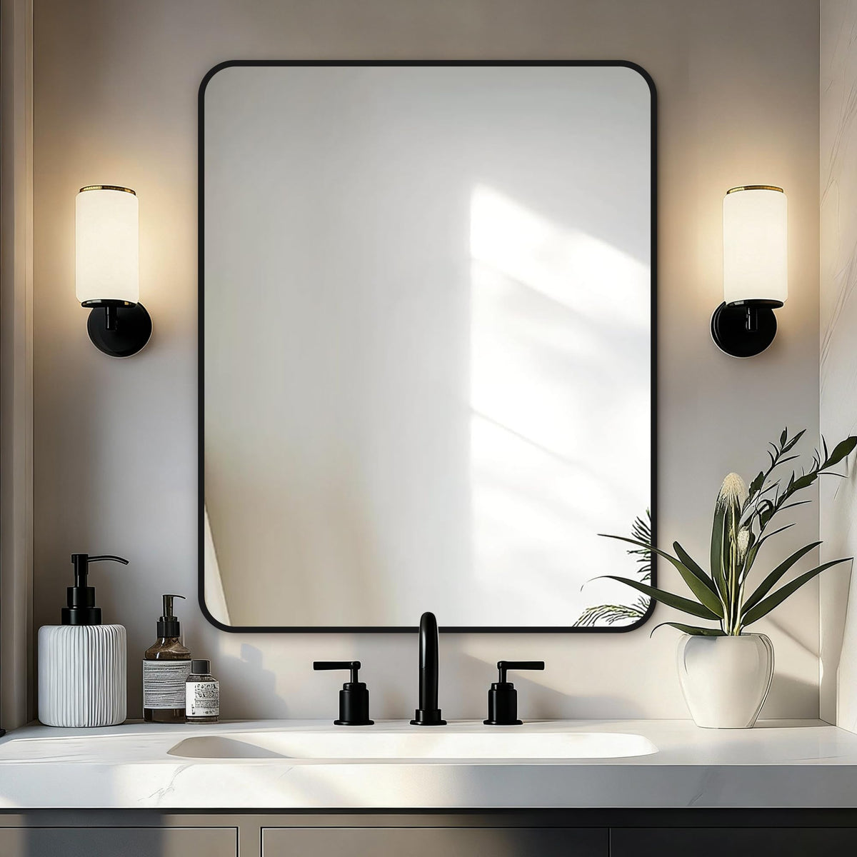 Delma over-sink mirror with black frame offers clear, distortion-free reflection for grooming.