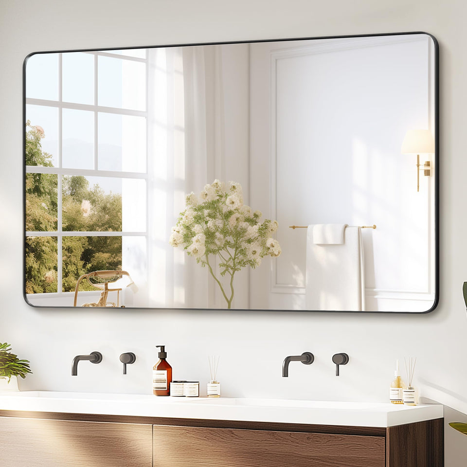 Delma black-framed bathroom mirror over sink provides distortion-free reflection for precise grooming.