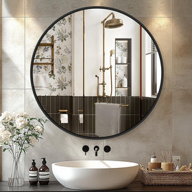Delma Black Round Mirror 22-Inch frame closeup showing a sturdy metal edge.