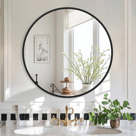 Delma Black Round Mirror 22-Inch reflection is clear for precise grooming.