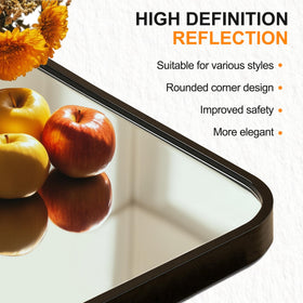 Delma wall mirror enhances living spaces with modern black frame