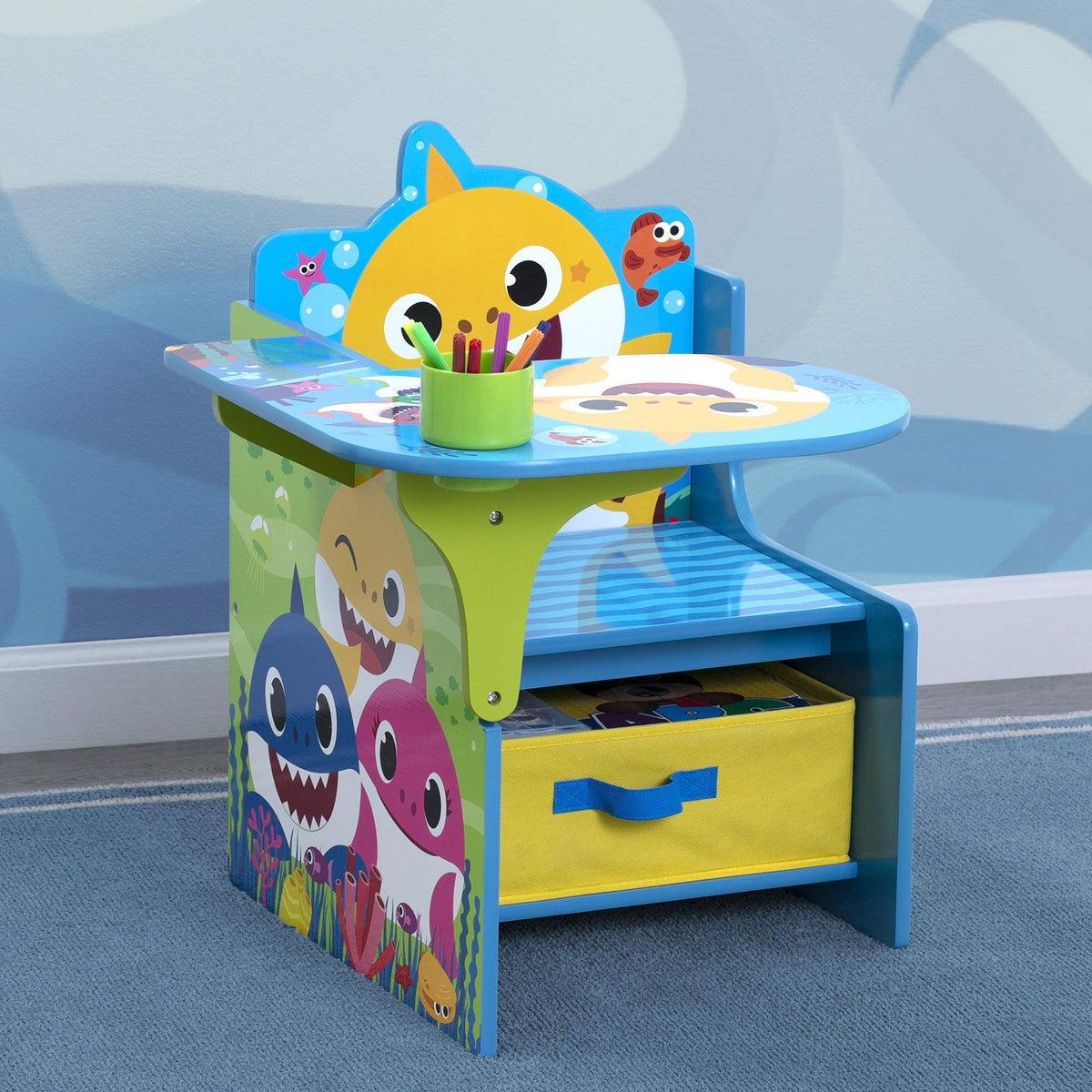 Delta Children chair desk features Baby Shark graphics that engage kids during activities.